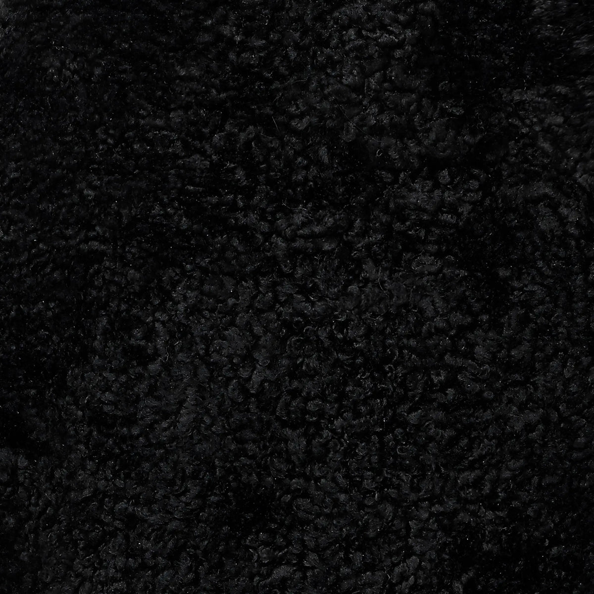 Skinnwille Curly 1.5 Fårskinn 60x135 cm, Svart